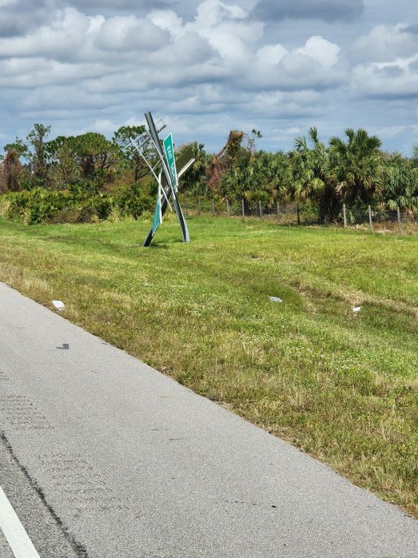 Twisted road sign